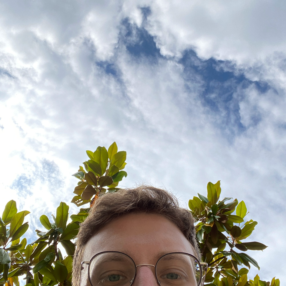 Photo of me in front of a blue sky